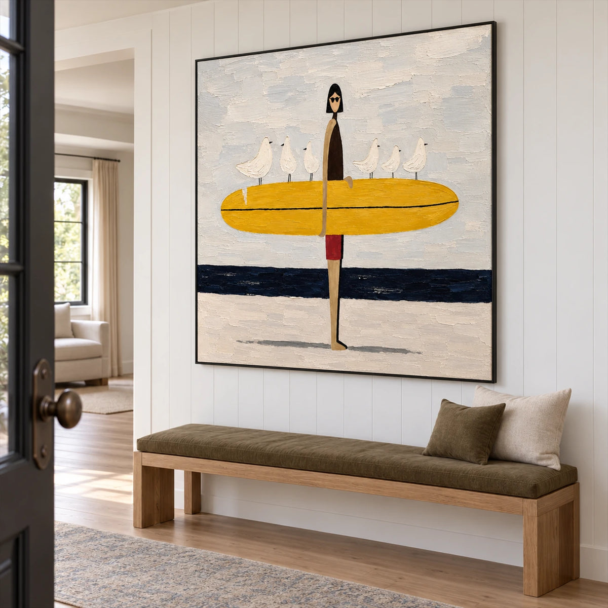 Gull Gathering artwork displayed above a cushioned entryway bench.