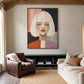 Pastel Stillness artwork displayed above a low console in a living room.