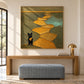 Golden Wanderer artwork displayed above a wooden console.