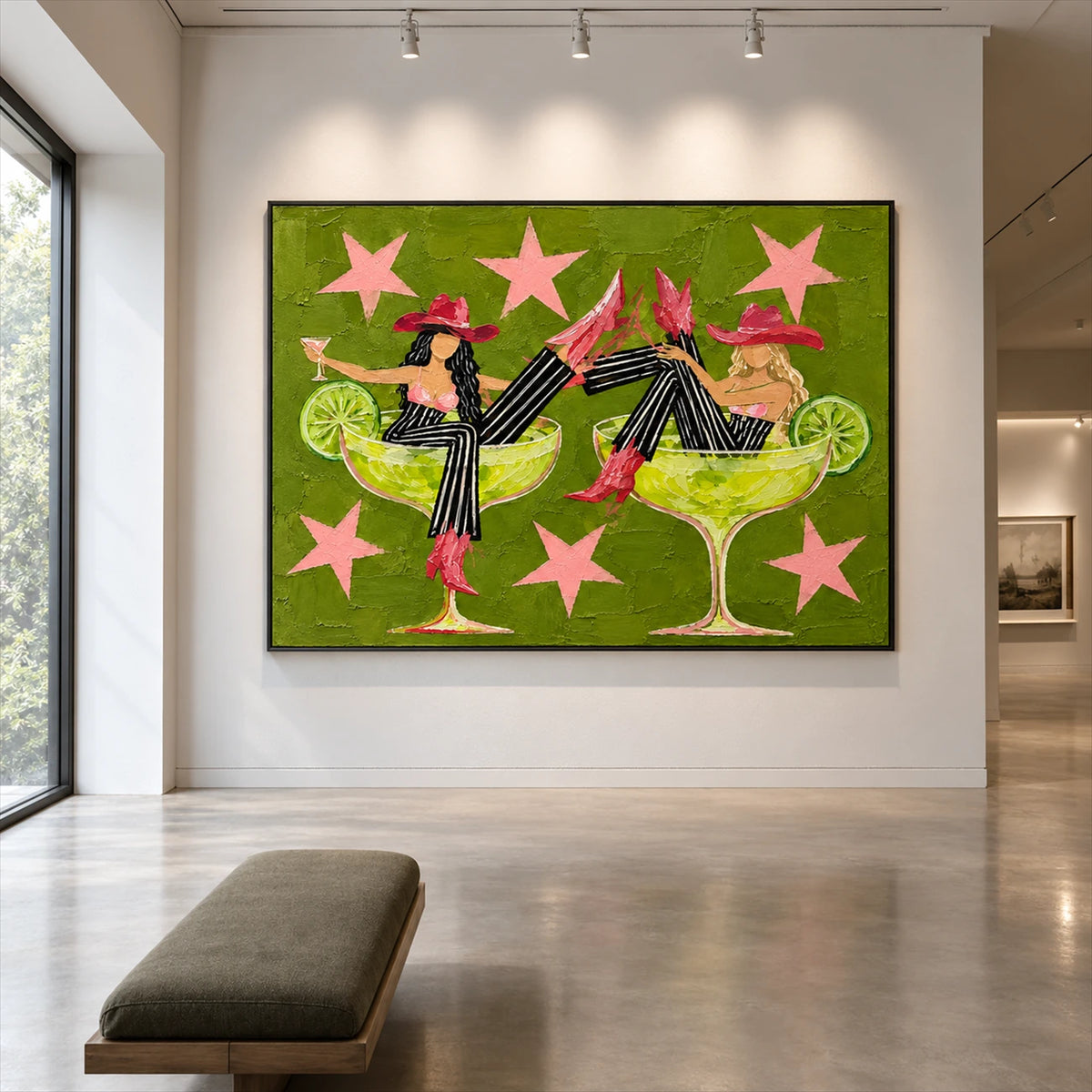 Lime Revelry artwork displayed on a gallery wall beside a bench.