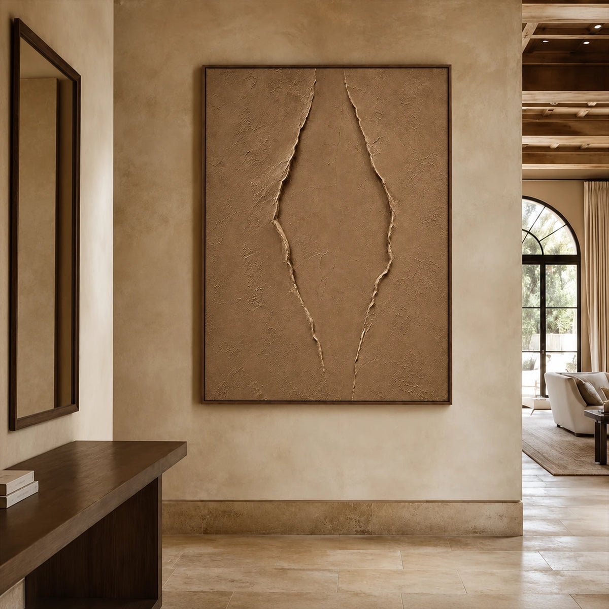 Earthen Fissure artwork displayed above a console in a stone entryway.
