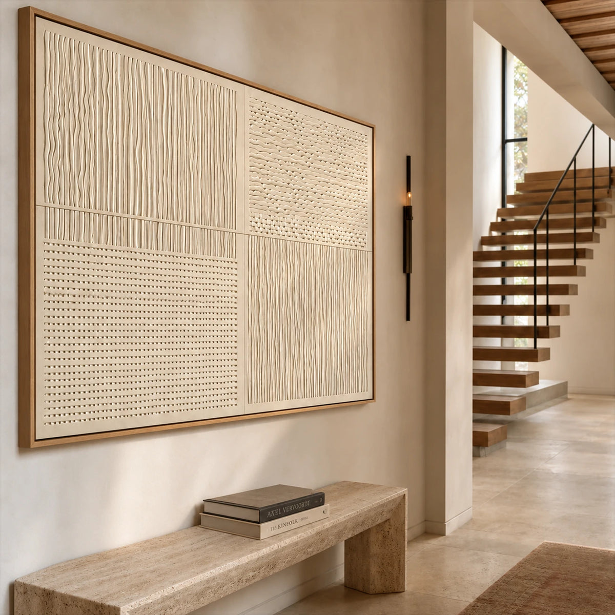 Ivory Quadrants artwork displayed above a narrow entryway console beside stairs.