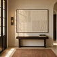 Ivory Quadrants artwork displayed above a console table in a softly lit hallway.