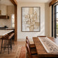 Ivory Strata artwork displayed beside a wooden dining table.