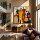 Syncopated Hues artwork displayed above a console in a tall sunlit lounge.