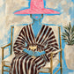 Fuchsia Reverie full artwork. A seated figure in a striped robe holds a cup beneath an oversized pink hat.