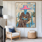 Fuchsia Reverie artwork displayed above a woven chair and wooden side table.