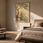 Olive Daydream artwork displayed beside a bed in a softly lit room.