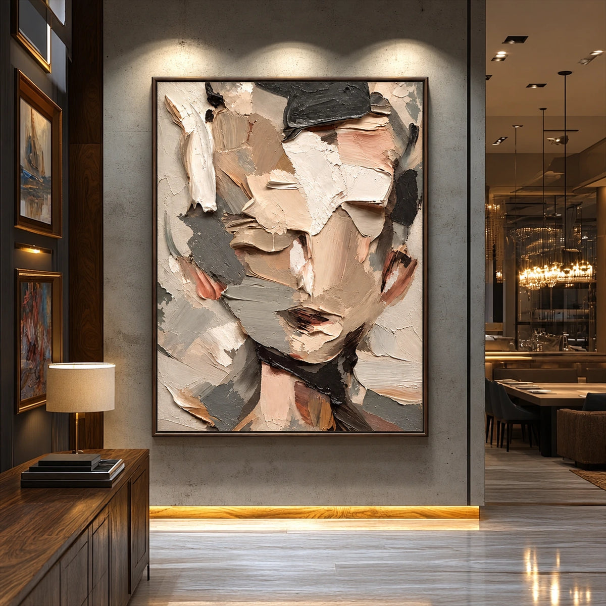 Fragmented Visage artwork displayed in a softly lit contemporary entryway.