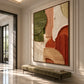 Terracotta Contours artwork displayed above a bench in a tall entryway.