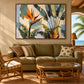 Tropical Flourish artwork displayed above an olive sofa near an arched window.