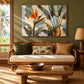 Tropical Flourish artwork displayed above a rattan sofa against a green wall.