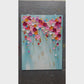 Bloom Cascade Wall Art hand-painting process — an artist builds colorful raised floral petals and gold accents on a pale turquoise canvas.